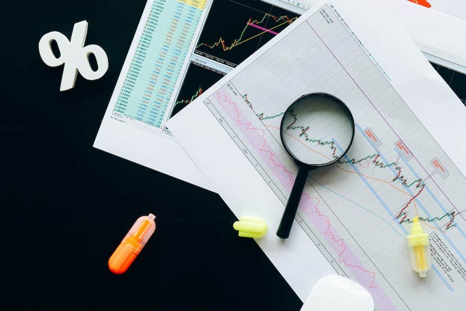 Image of tax relief documents with magnifying glass.